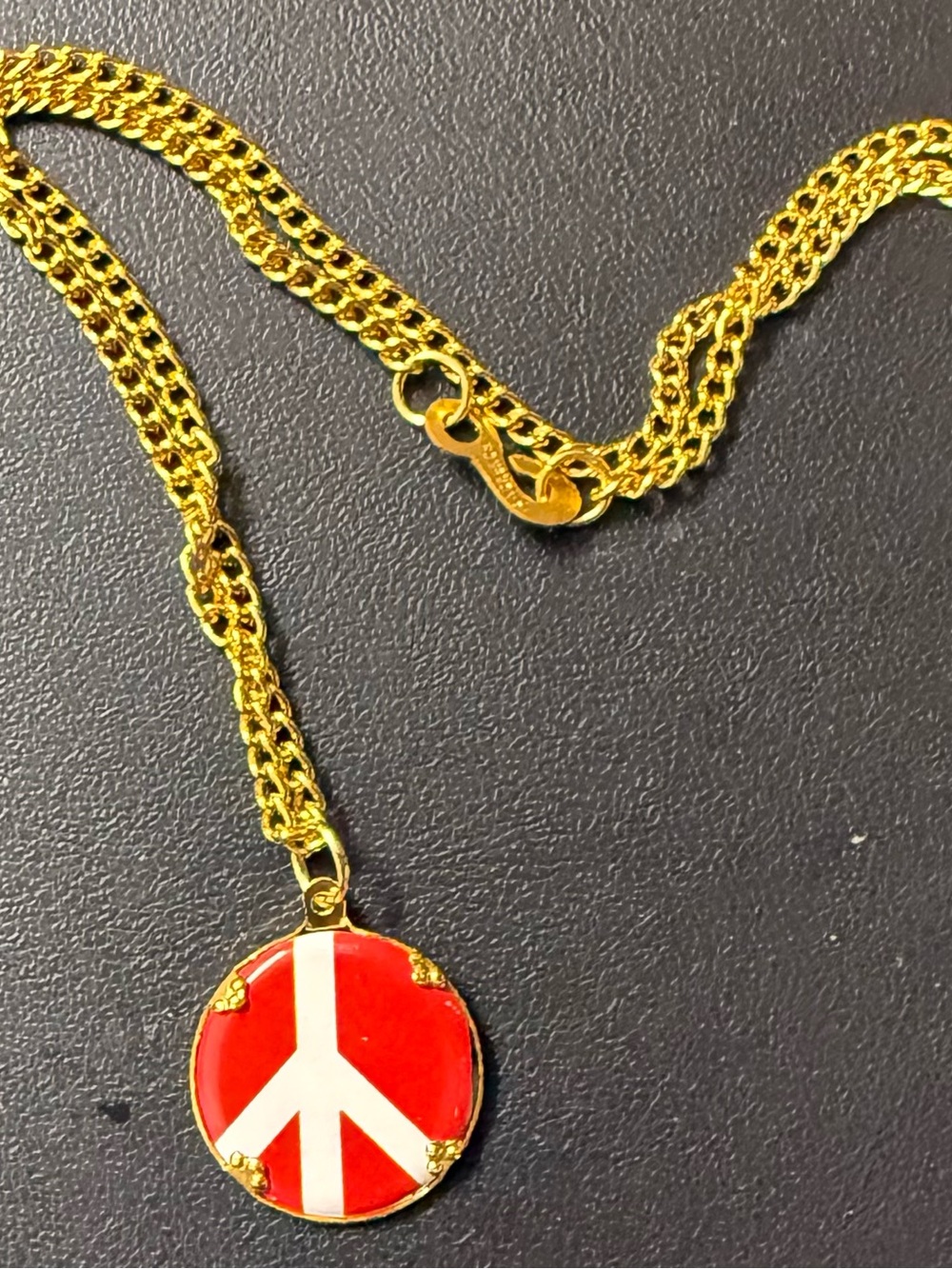 Gold-Tone Necklace with Red and White Peace Sign Pendant
